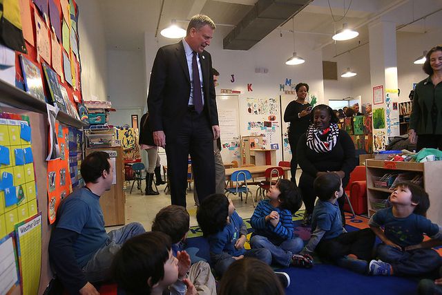 Mayor Bill de Blasio surrounded by children at the Sunnyside Community Services pre-K class on March 14th, 2014.